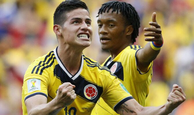 James Rodríguez celebra un gol con Cuadrado de fondo. Conoce las cuotas del Colombia vs Inglaterra.